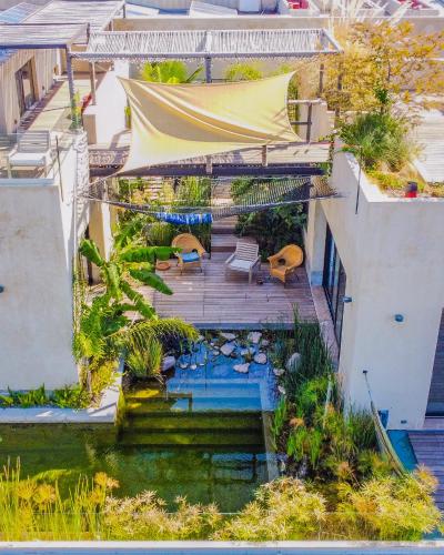 an aerial view of a house with a pond at Cuna del Cielo in San Miguel de Allende