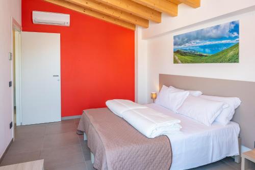 Postel nebo postele na pokoji v ubytování Corte Rocchetti Suite