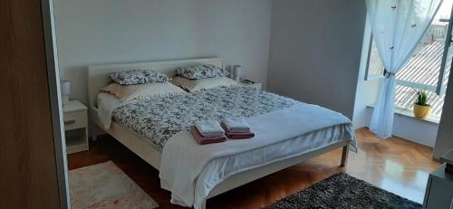 Posteľ alebo postele v izbe v ubytovaní Apartman LAMI