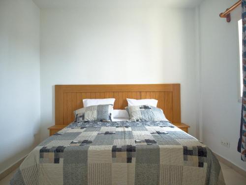 מיטה או מיטות בחדר ב-Nomsa Zen Appartement