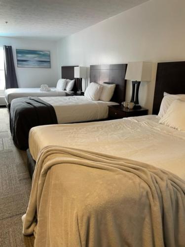 Letto o letti in una camera di Bay Lodging Resort