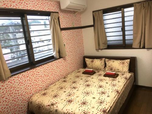Ένα ή περισσότερα κρεβάτια σε δωμάτιο στο Cozy Family room KY apartment