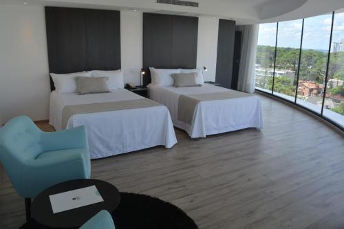 Postel nebo postele na pokoji v ubytování Don Hotel