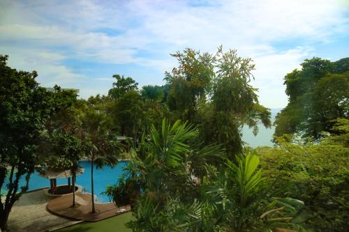 a view of the pool from the resort at Cosy Beach Hotel - SHA Extra Plus in Pattaya South