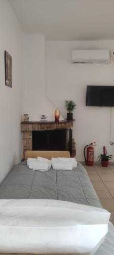 En eller flere senge i et værelse på Fani's apartments 3