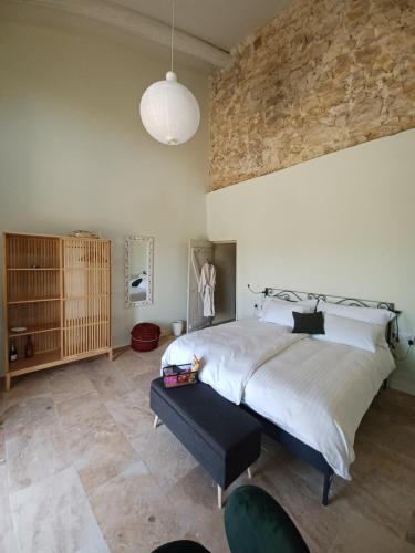 Postel nebo postele na pokoji v ubytování Mas Les Escourtades Chambres d'hôtes