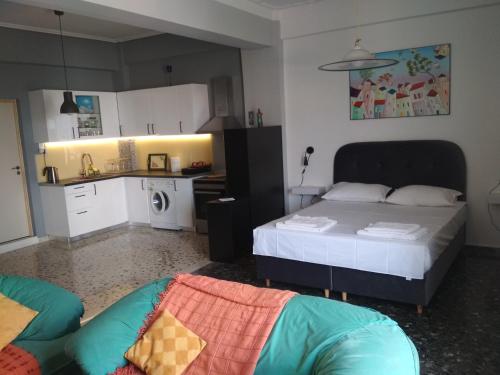 Postel nebo postele na pokoji v ubytování RethNet Spacious Studio