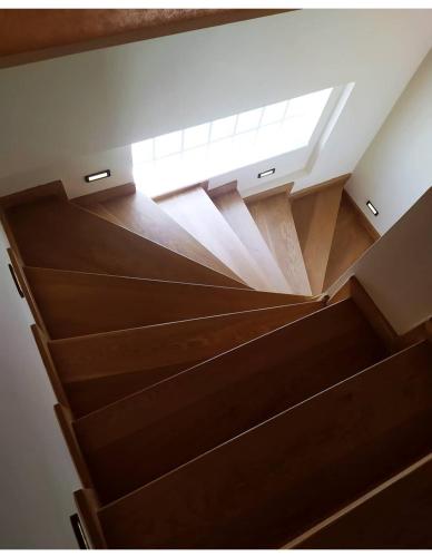 a stairwell with a skylight in a building at Chara host in Olympia
