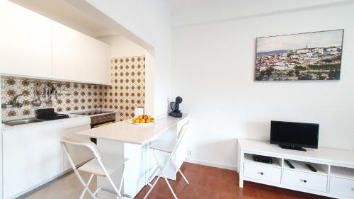 Foto Coimbra's Gray & White 1
