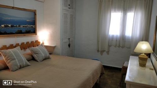 Tempat tidur dalam kamar di Casa Beja