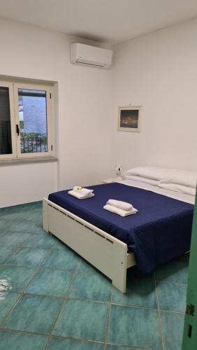 Krevet ili kreveti u jedinici u objektu Villa Palinuro
