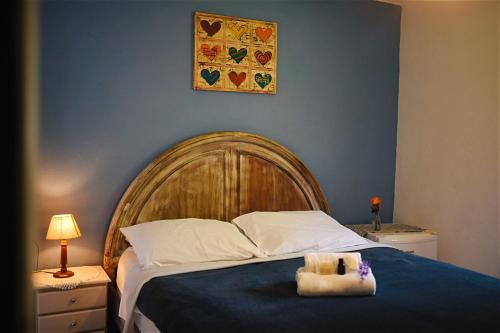Cama ou camas em um quarto em Pousada Casa Azul