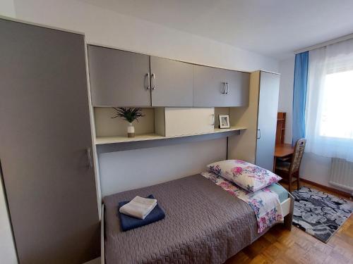 Llit o llits en una habitació de Apartment Buga