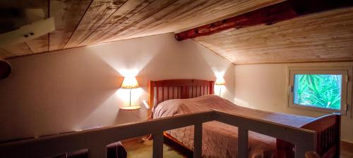 Postel nebo postele na pokoji v ubytování Residence Les Jardins de Sainte-Lucie "Piscine chauffée"