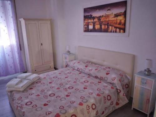 Un pat sau paturi într-o cameră la Dal Pontefice