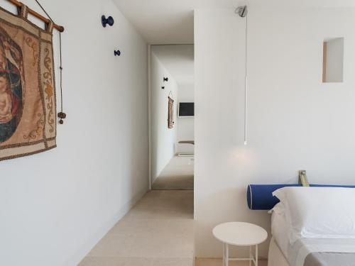 Ένα ή περισσότερα κρεβάτια σε δωμάτιο στο Kubo Sea Views Luxury Escape
