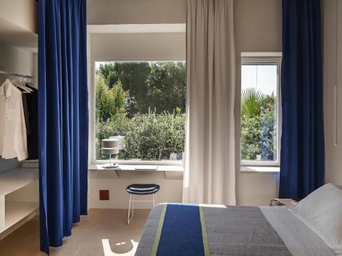 Ένα ή περισσότερα κρεβάτια σε δωμάτιο στο Kubo Sea Views Luxury Escape