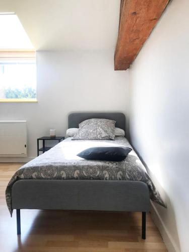 Ein Bett oder Betten in einem Zimmer der Unterkunft Chez le Paul
