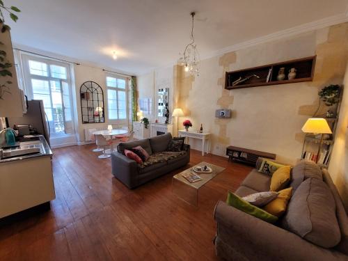 Et opholdsområde på Appartement central typiquement bordelais