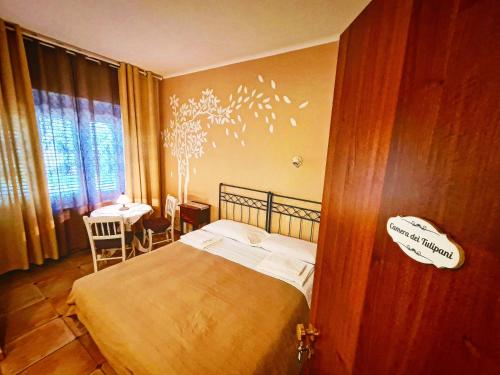 Postel nebo postele na pokoji v ubytování Bio Agriturismo Mare in Campagna