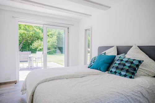 Giường trong phòng chung tại Hohwaii Cottage