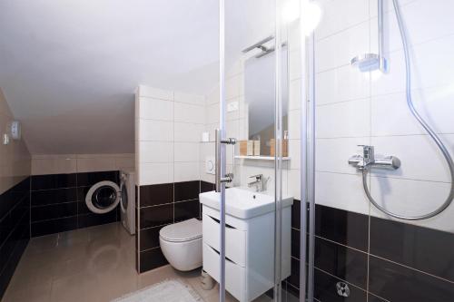 Kúpeľňa v ubytovaní Apartman L