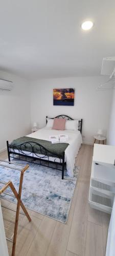 Кровать или кровати в номере Rosa D'Aveiro