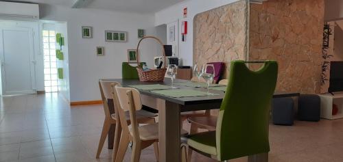 A restaurant or other place to eat at Lovely new House - Guests Apartments