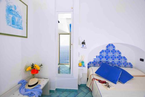 Ένα ή περισσότερα κρεβάτια σε δωμάτιο στο Hotel La Ninfa