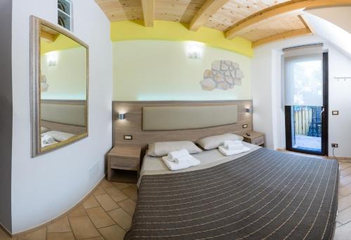 Ein Bett oder Betten in einem Zimmer der Unterkunft La Piana Affittacamere
