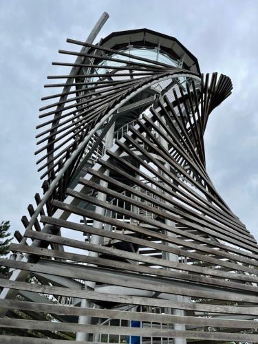 a building with a twisting steel structure at Pirin Dream View Apartments in Razlog