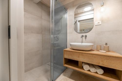a bathroom with a sink and a shower at Superior Room Gabriela in Dubrovnik