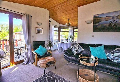 a living room with a couch and a table at Dot's Place 1 in Carnforth