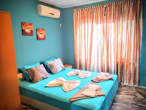 Ένα ή περισσότερα κρεβάτια σε δωμάτιο στο All inclusive luxury villa with sea view