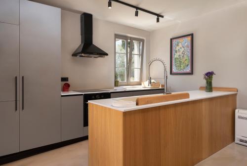 a kitchen with a sink and a counter top at Casa Sol in Zadar