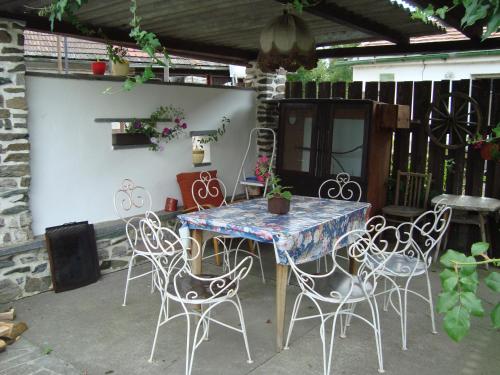a table and chairs sitting on a patio at Privát Mirovice-Březnice in Mirovice