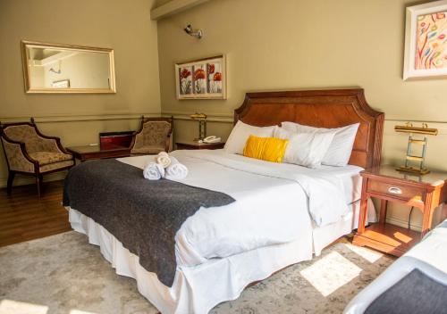 Ένα ή περισσότερα κρεβάτια σε δωμάτιο στο Hotel Casa Zañartu