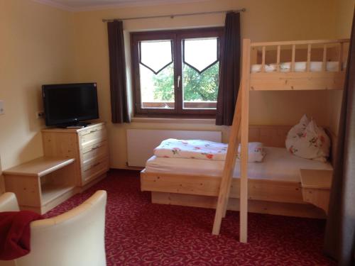 Ένα ή περισσότερα κρεβάτια σε δωμάτιο στο Weisssteinalm