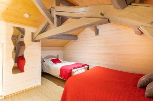 Postel nebo postele na pokoji v ubytování Gîte Tour du Rocher