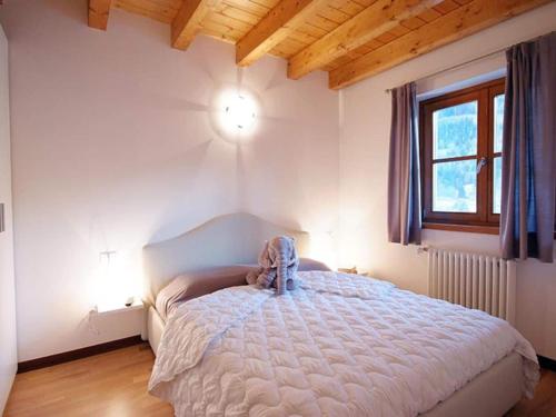 Postel nebo postele na pokoji v ubytování Hilltop apartment in Pr Saint Didier with balcony