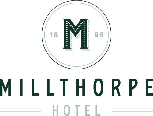 a logo for a hotel with the letter m at Millthorpe Hotel in Millthorpe
