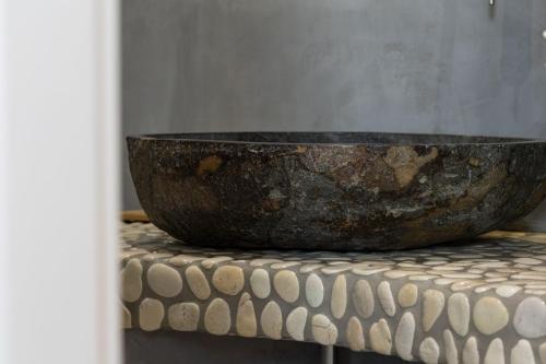 a large bowl sitting on top of a table at Emery Hotel in Naxos Chora