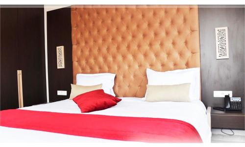 Katil atau katil-katil dalam bilik di Hôtel Lescure Business and SPA