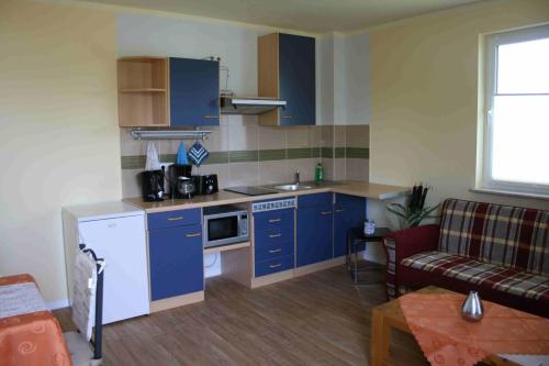 Dapur atau dapur kecil di Übernachtung bei Michael - Ferienwohnung Rostock
