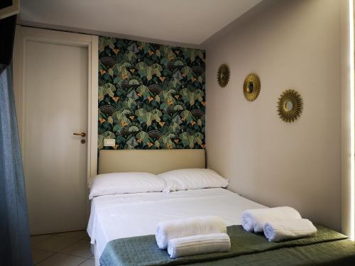 A bed or beds in a room at Marilor Apartments
