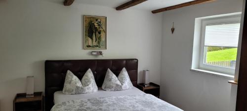Postel nebo postele na pokoji v ubytování Ferienwohnung Lohnerlehen