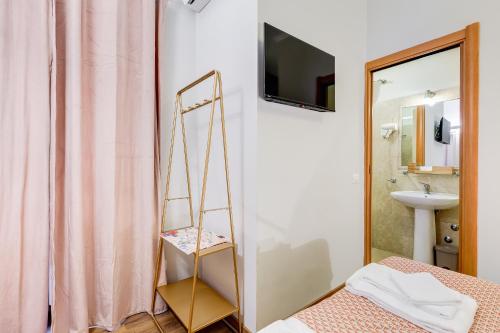 Koupelna v ubytování JMartins Roma Suites