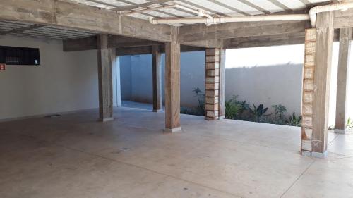 an empty room with a view of a mountain at STUDIO CENTRAL IV in Cascavel