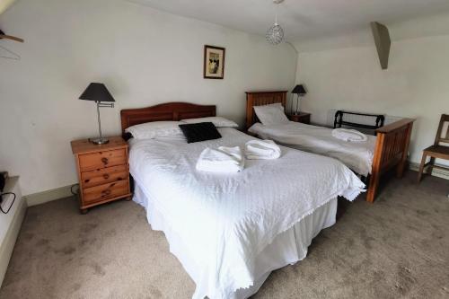 Ένα ή περισσότερα κρεβάτια σε δωμάτιο στο The Darlington