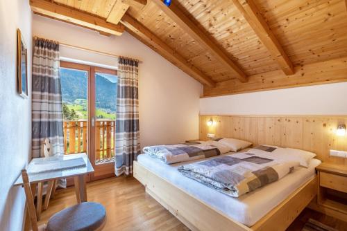 Postel nebo postele na pokoji v ubytování Thusnelda Apartment C